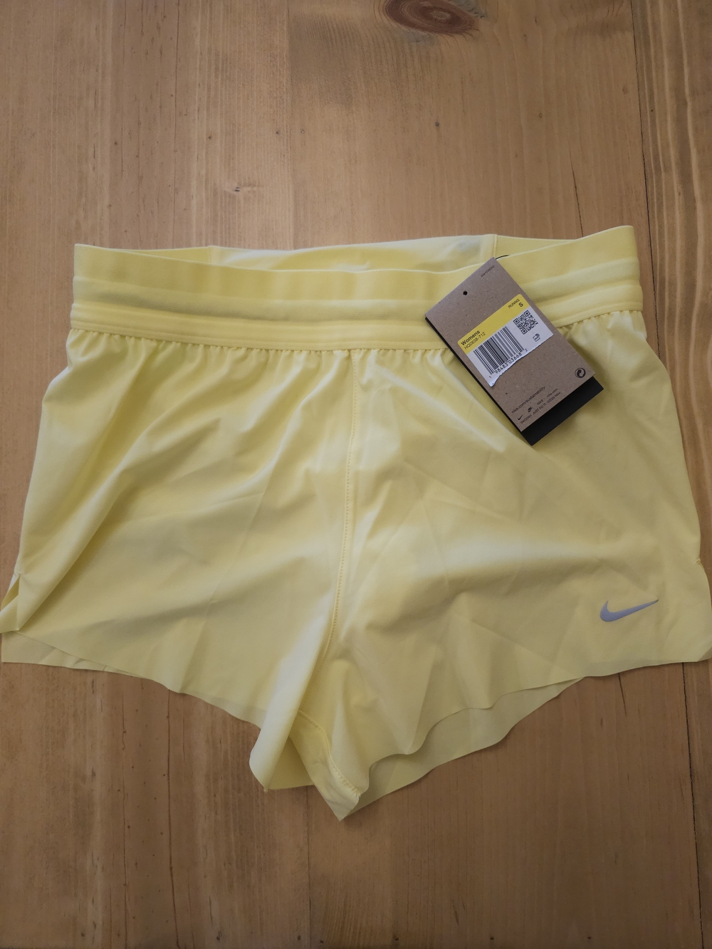 Nike Women's Light Yellow Athletic Shorts
